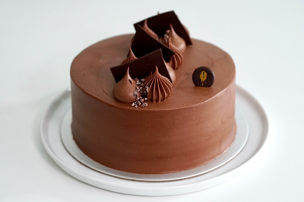 Dark Chocolate Cake with Whipped Caramelized White Chocolate Ganache - Bake  from Scratch